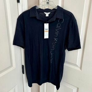 Men's Calvin Klein, Black Polo Shirt  Size S NWT Brand Name Vertically On Front
